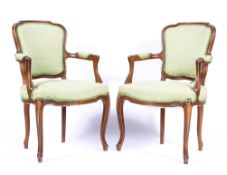 A pair of French Louis XV style armchairs, 19th century,