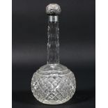 A silver topped cut-glass scent bottle, hallmarked Birmingham, 1898, makers marks for M. Bros.