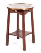 An Arts and Crafts Liberty style oak copper topped occasional table, circa 1890,