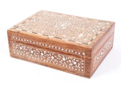 An early 20th century Anglo-Indian bone inlaid hardwood jewellery box, of rectangular form,