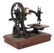 A 19th century (Willcox & Gibbs) chain stitch sewing machine, circa 1865,