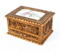 A Chinese carved wooden box inset with a Chinese porcelain plaque, late 19th/early 20th century,