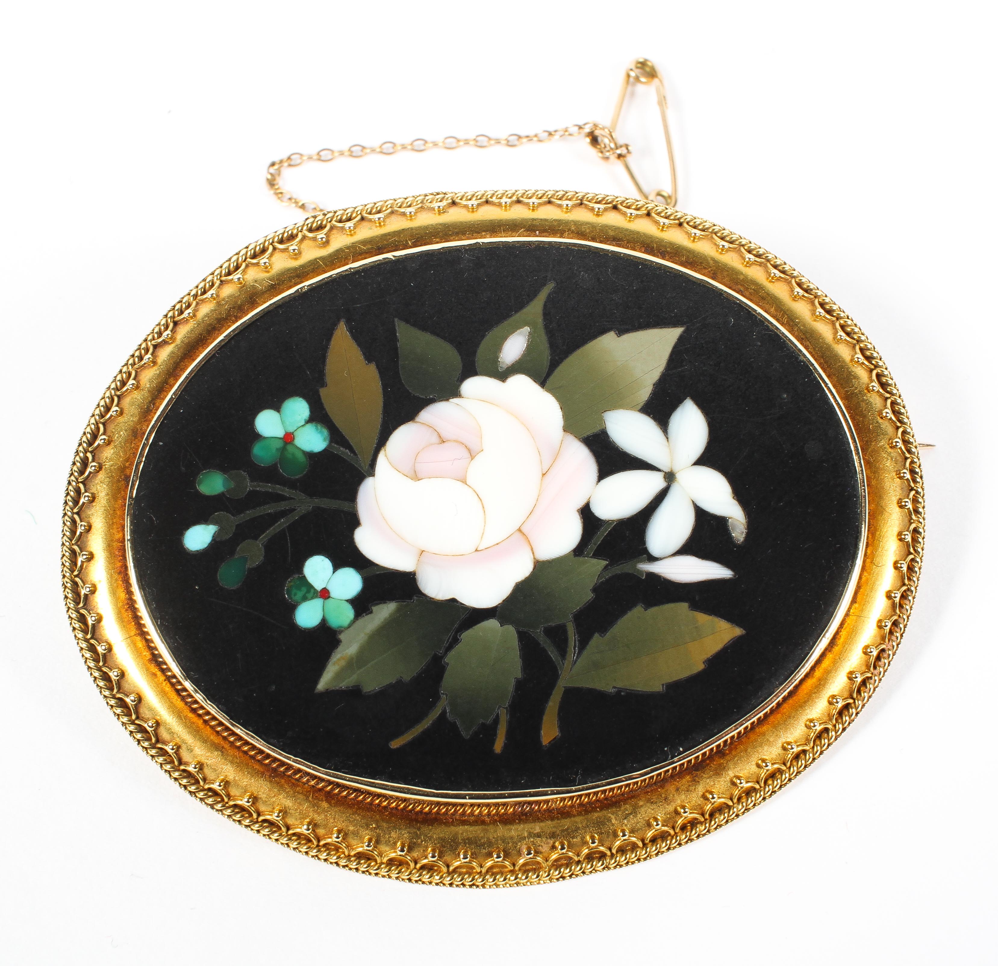 A 19th century grand tour yellow metal Pietra Dura brooch,