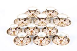 A Royal Crown Derby Imari pattern part tea and coffee service, 20th century, printed iron-red marks,