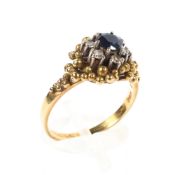 An 18ct gold sapphire and diamond dress ring,