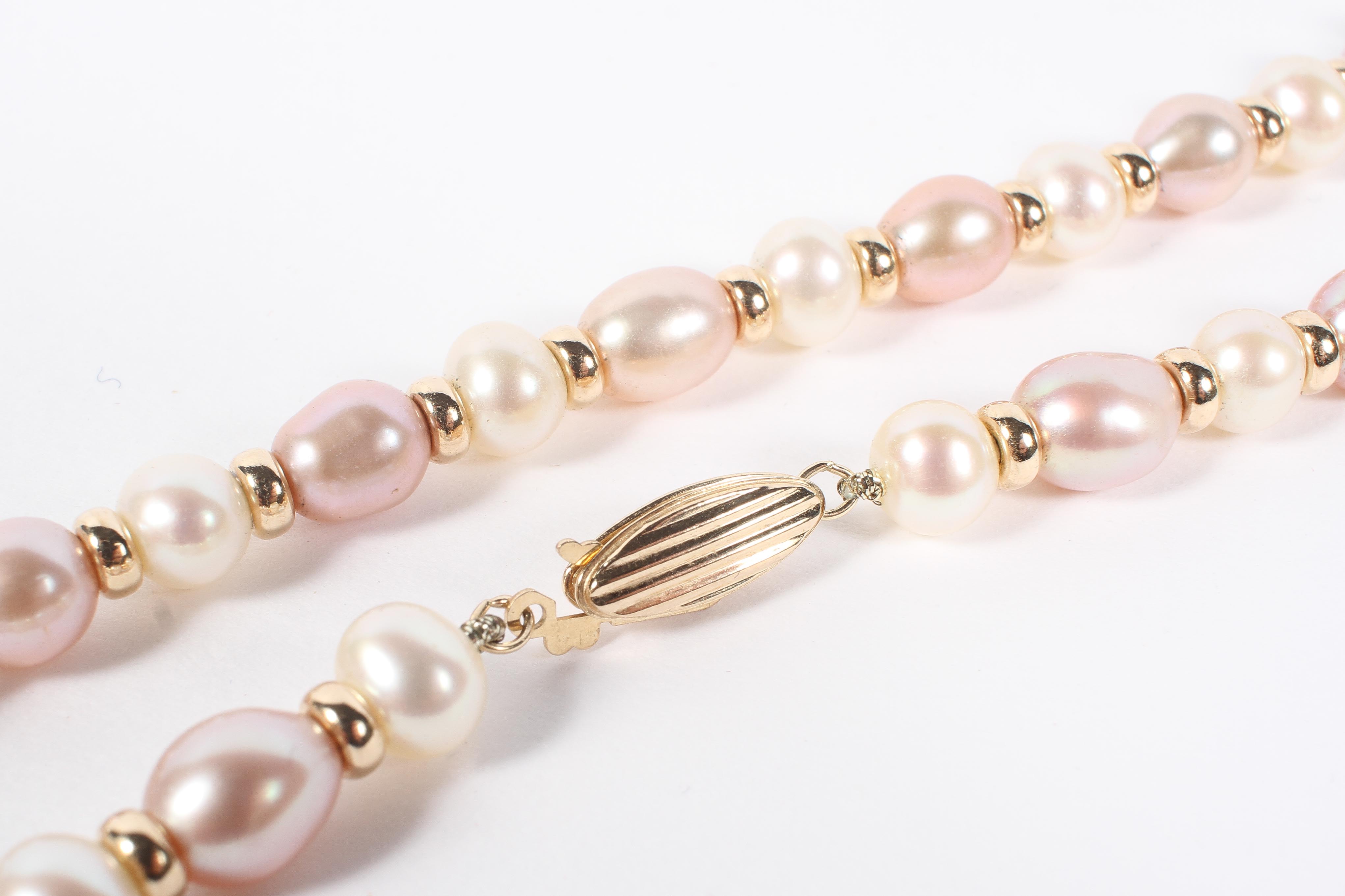 A Continental 9ct gold pearl necklace, the pearls interspersed between 9ct gold rings, - Image 2 of 2