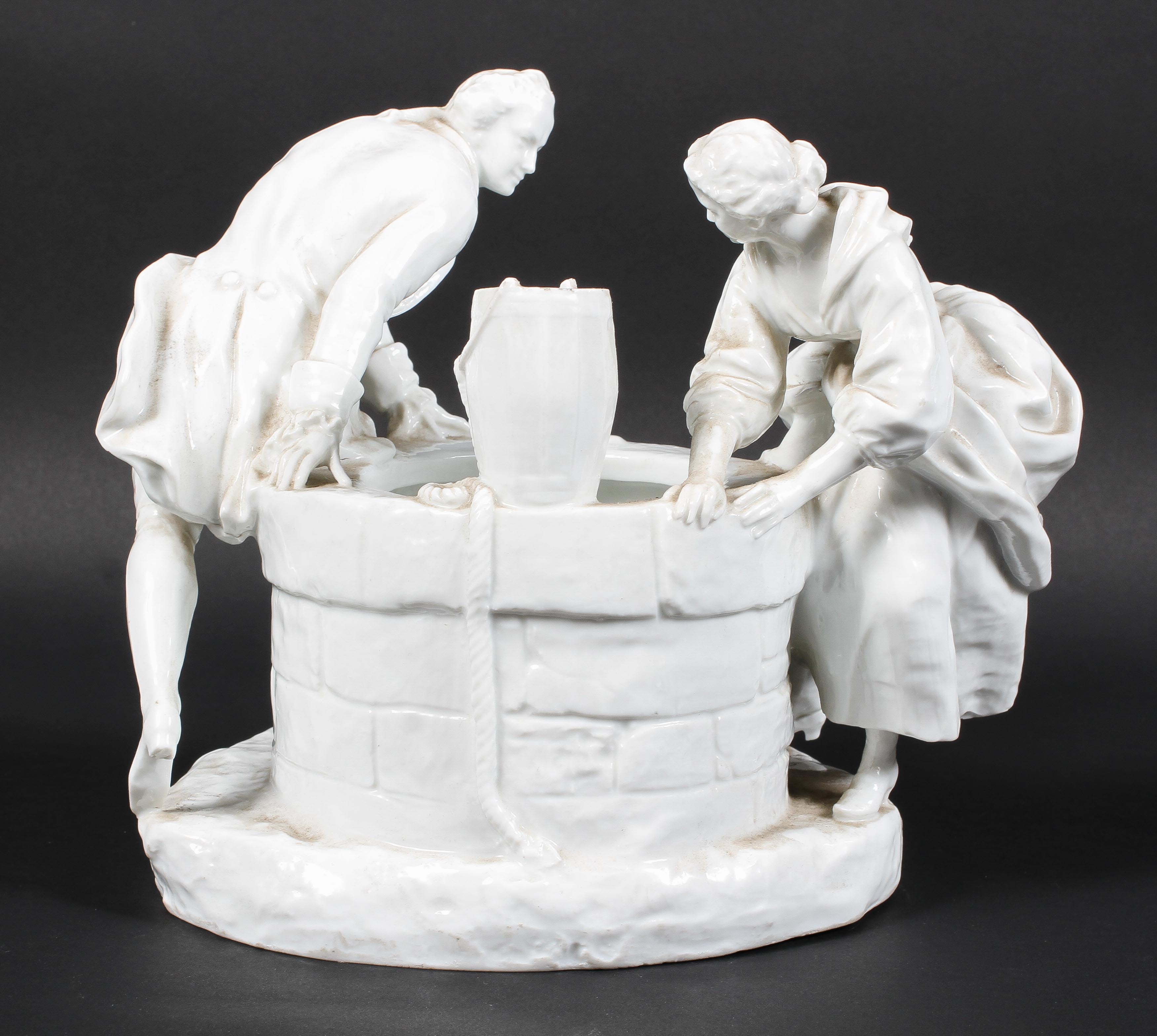 A Continental porcelain figure group beside a well, late 19th century, - Image 2 of 3