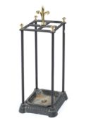 A Victorian style brass and cast metal stick stand,