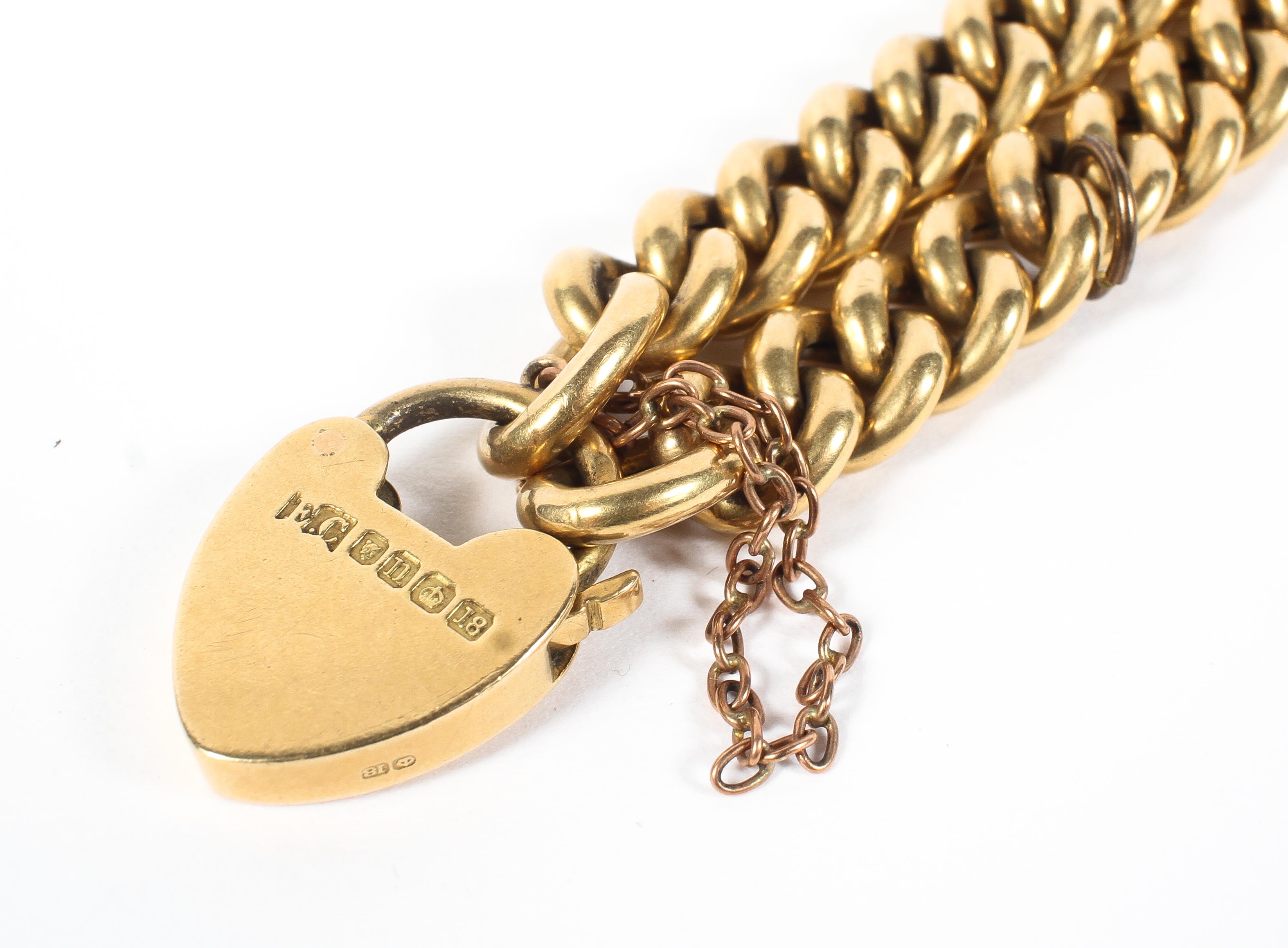 An 18ct gold curb link bracelet with heart locket, the locket hallmarked Sheffield 1930, 19. - Image 2 of 2