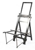 A Victorian Aesthetic Movement ebonised travelling easel, late 19th century,