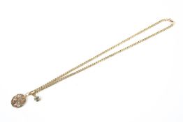 A yellow metal curb link necklace chain,
