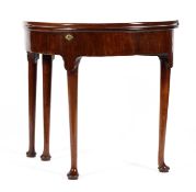 A Georgian mahogany demi lune table,