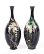 A pair of Japanese Meiji period (1868-1912) cloisonne vases,