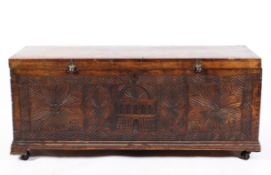 A carved oak coffer, 19th century,