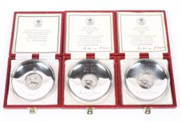 Three sterling silver limited edition commemorative crown dishes,
