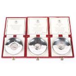 Three sterling silver limited edition commemorative crown dishes,