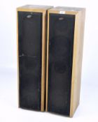 A pair of Eltax 'Symphony Six' speakers, no.1367, within wooden cases, height 84cm.