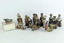 A collection of Tremar pottery figures,