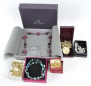 A selection of contemporary necklaces, of assorted designs, several decorated with beads and pearls,