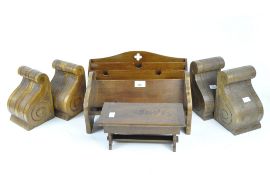 Two pairs of wooden bookends of scrolling form, height 20cm,