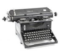 A vintage Imperial typewriter, the black metal structure with black keys,