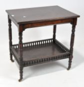 An early 20th century rectangular mahogany side table with lower galleried shelf