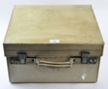 An early/mid 20th century vellum bound travelling case