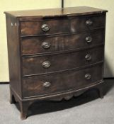 A Victorian mahogany bow fronted chest of drawers, comprising two short over three long drawers,