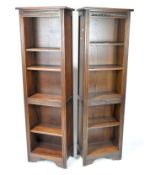 A pair of contemporary bookcases by Wood Bros's Furniture Ltd,