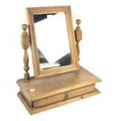 A 20th century pine dressing table swing mirror,