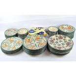 A collection of continental ceramic plates and dishes,