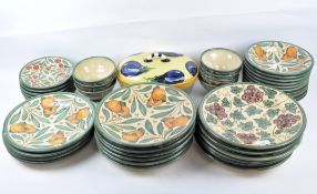 A collection of continental ceramic plates and dishes,