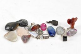 A selection of silver jewellery and minerals,