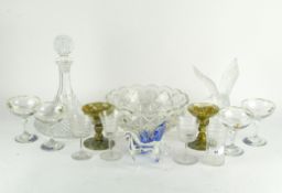 A collection of glassware, featuring drinking glasses by Babycham, a decanter, and other items