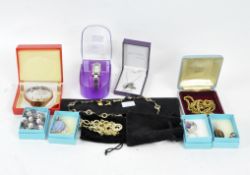 A selection of costume jewellery and watches, with some silver examples