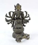 A Tibetan yellow metal vajra and a 'thousand arm' Thai buddha, 20th century,