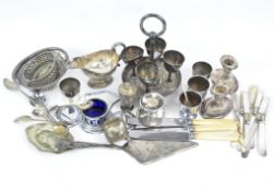An assortment of silver plated wares, including egg cup stand.