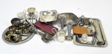 An assortment of silver plate, to include a four slice toast rack,
