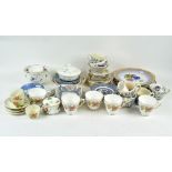 A large selection of ceramics, including teacups and saucers, a tureen, bowl and plates,