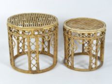 Two wicker tables, of circular form, both with scrolling decoration around the edges,
