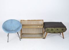 A contemporary chair and stool together with a wooden plate rack,