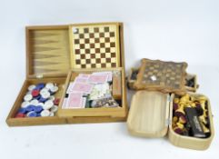A travelling backgammon set, three chess sets and other games,