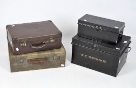 Two metal deed boxes and two vintage suitcases,