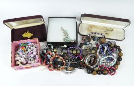 A large selection of assorted costume jewellery, to include necklaces,