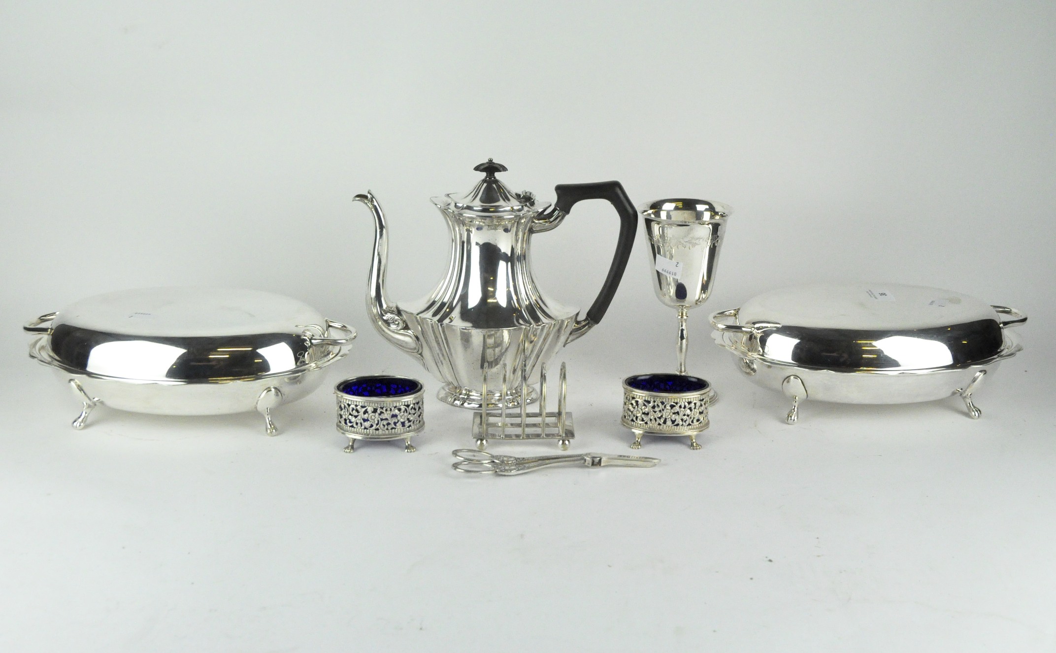 A collection of 20th century silver plate, comprising a pair of tureens, coffee pot, goblet,