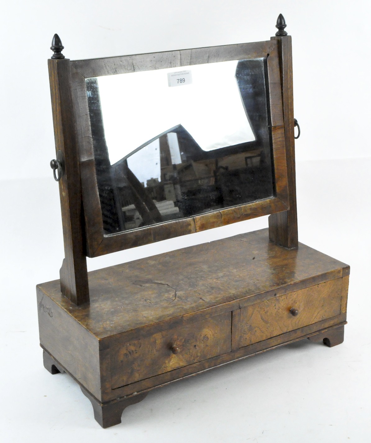 An early 20th century burr walnut veneer dressing table swing mirror with two small drawers,
