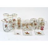 A large collection of sporting related glassware,