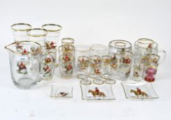 A large collection of sporting related glassware,