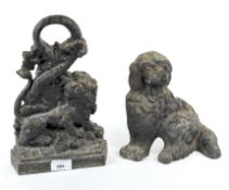 Two cast metal door stops, one modelled as a seated dog, height 20cm,