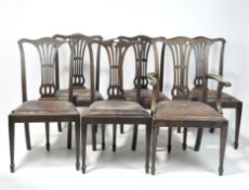 A set of six Chippendale style mahogany dining chairs, one a carver example,